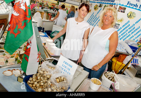 Carol Watts Gower Cockles and Shellfish stall in Swansea Indoor Food Market Wales UK GB EU Stock Photo