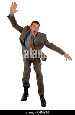 Businessman jumping in the air Stock Photo