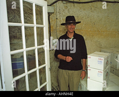 Edouard Pisani wearing a hat in his wine cellar at Chateau de Targe in Saumur Champigny, Maine et Loire France Stock Photo
