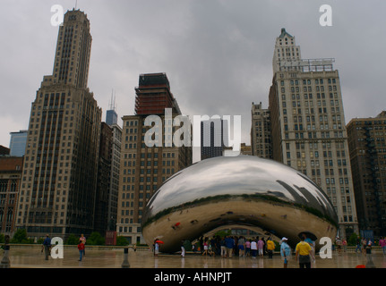 The stainless steel Cloud Gate sculpture aka  'the Bean' by British artist Anish Kapoor in Millennium Park, Chicago, IL, USA Stock Photo