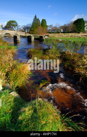 Village of Postbridge Dartmoor showing both the newer stone road bridge crossing and the ancient 14th century clapper bridge Stock Photo