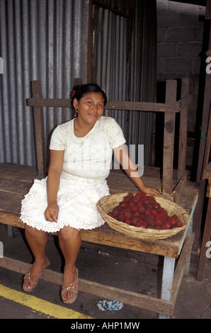 Friendly woman selling fruit in the Mercado Municipal, Masaya, Nicaragua, Central America Stock Photo