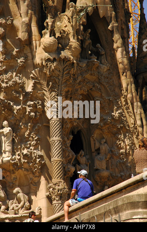 Gaudi's La Sagrada Familia cathedral under continous construction at Barcelona, Spain, maintains it's attraction to tourists Stock Photo