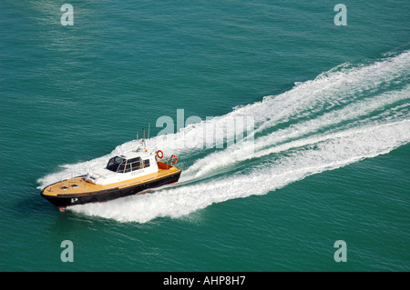 Pilot boat speeding through the port of Palma, Majorca Stock Photo