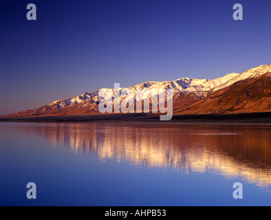 Sunrise on Steens Mountains with reflection in Mann Lake Oregon Stock Photo