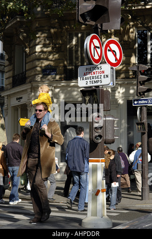 Traffic lights and roadsigns pedestrian crossing the street on Place Saint Sulpice in Paris France Stock Photo