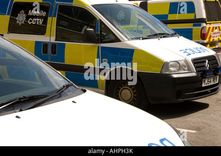 Parked police vehicles vans England UK United Kingdom GB Great Britain Stock Photo