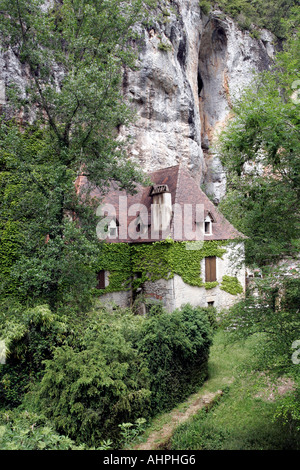 House under a cliff, France Stock Photo