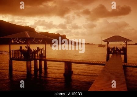 Rumors nightclub on Sokehs Harbor at dusk with Sokehs Island behind Pohnpei Micronesia  Stock Photo