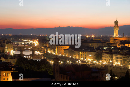 The East side of the ponte Vecchio and the river Arno at twilight Stock Photo