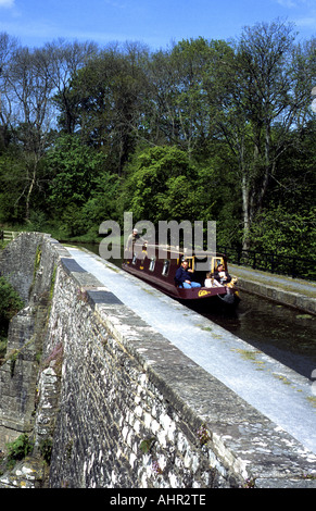 Narrowboat crossing Brynich Aqueduct on Brecon Abergavenny Canal, Powys, Wales, UK Stock Photo