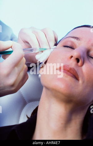 Woman having neurotoxin injection Stock Photo