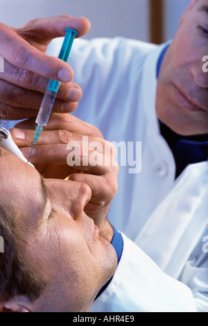 Man having neurotoxin injection Stock Photo