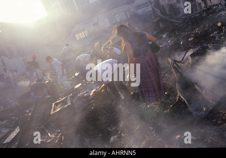 Family salvaging possessions after riots South Central Los Angeles California Stock Photo