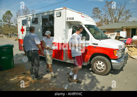 Victims of Hurricane Ivan in Pensacola Florida suburb come to Red Cross emergency for food water and ice Stock Photo