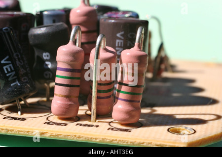Very close view of group of resistors on an electronic circuit board. Stock Photo