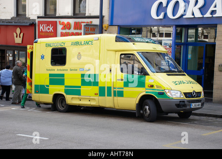 ambulance attending an emergency in Huddersfield England Stock Photo