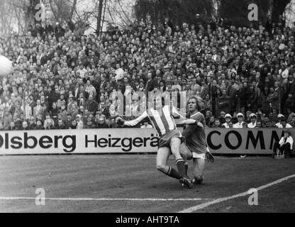 football, Bundesliga, 1971/1972, FC Schalke 04 versus 1. FC Kaiserslautern 3:0, Stadium Glueckaufkampfbahn in Gelsenkirchen, scene of the match, duel between Klaus Ackermann (FCK) left and Juergen Sobieray (S04) Stock Photo