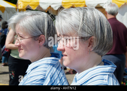 Twins Convention at Twinsburg Ohio Gray hair sisters Stock Photo