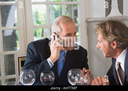 Two businessmen having lunch Stock Photo