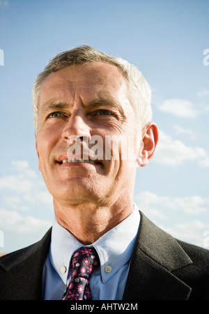 Smiling businessman outdoors Stock Photo - Alamy