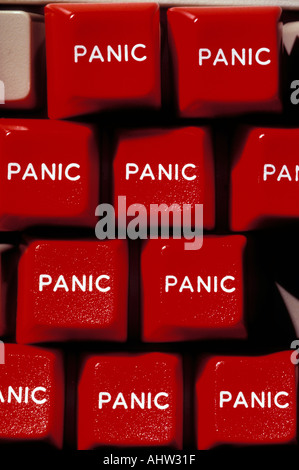 Red panic buttons on computer key board Stock Photo