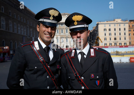 head and shoulders of Two Arma Dei Carabinieri Italian police officers on duty in Piazza Venezia Rome Lazio Italy Stock Photo