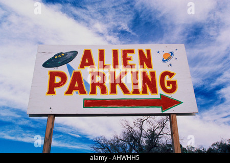 This is a road sign indicating where Alien Parking is This is the original UFO  crash site in Roswell There are small UFOs on Stock Photo - Alamy