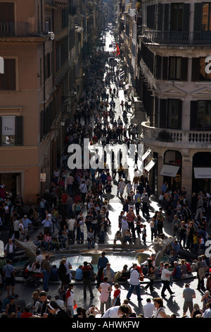 looking down over crowd of tourists and locals on the spanish steps towards Via Condotti Rome Lazio Italy Stock Photo