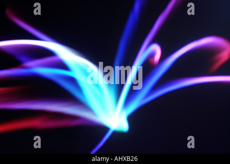 Abstract graphics formed by moving neon streaks of light Stock Photo