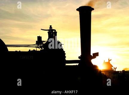 Silhouetted Steam Engines at Sunset Stock Photo - Alamy