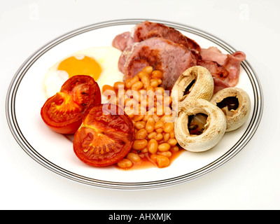 Healthy Traditional Full English Breakfast With Bacon Fried Egg Grilled Mushrooms And Tomatoes Isolated Against A White Background With Clipping Path Stock Photo