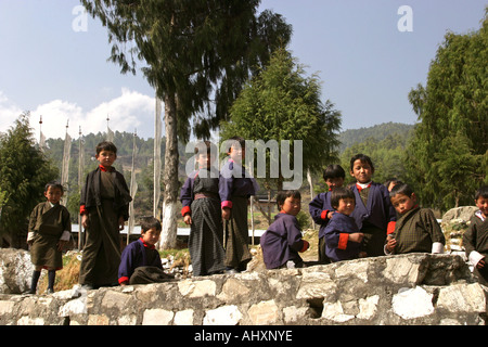 Bhutan education Haa Valley Bitekha Lower Secondary School young students on school wall Stock Photo