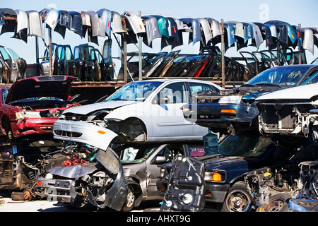 Cars and car parts in junkyard Stock Photo