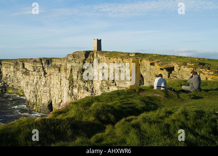 dh Marwick Head BIRSAY ORKNEY Tourist couple birdwatching RSPB Bird Nature Reserve Kitchener Memorial