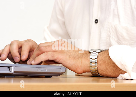 Man working on laptop Stock Photo