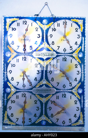 Crown Point Tobago Al Tawbah Mosque Clocks showing Prayer Times Stock Photo