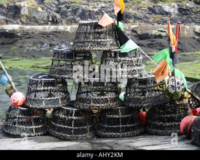 Colourful lobster pots stacked in a pyramid, as Boscastle harbour Stock Photo