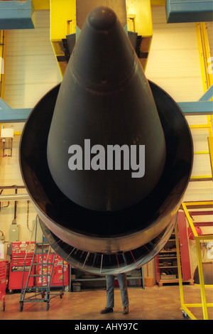 Aero engineer working on a jet engine at a service facility in the UK Stock Photo