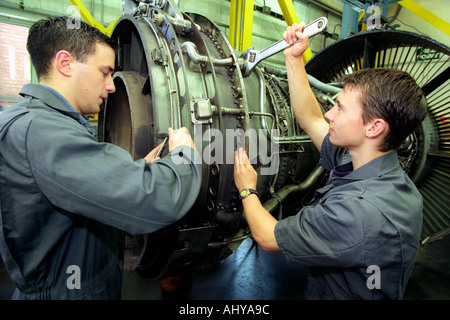 Modern Apprentices working on an aircraft jet engine UK Stock Photo