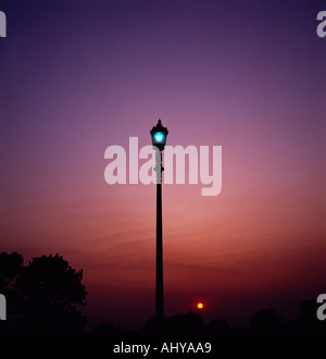 Sunset at Primrose Hill in London in England in Great Britain in the United Kingdom UK. Night Nightfall Sky Light Camden Town