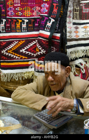 Libyan Traditional Rug Tripoli, Libya. Rug and Souvenir Vendor in the Medina (Old City). He ...