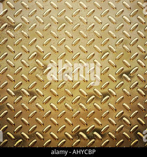 a very large sheet of roughened gold tread or diamond plate Stock Photo