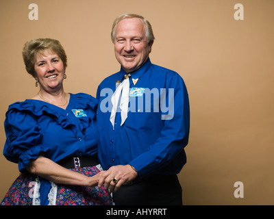 Senior couple in square dancing outfits Stock Photo