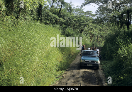 Pick-up truck loaded up with people going to the Monday market in Lenakell village on the island of Tanna, Vanuatu. Stock Photo