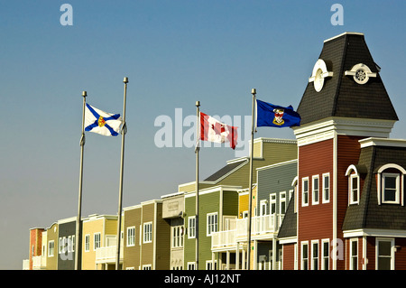 Flags fly in front of new condominium development in downtown Wolfville, Nova Scotia, Canada.