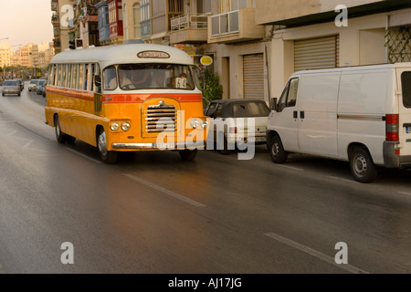 Maltese Bus In St Julians Bay Stock Photo