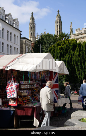 The busy Market behind Saint Marys with the pinnacles of Kings Chapel in the background Cambridge Cambridgeshire UK Stock Photo