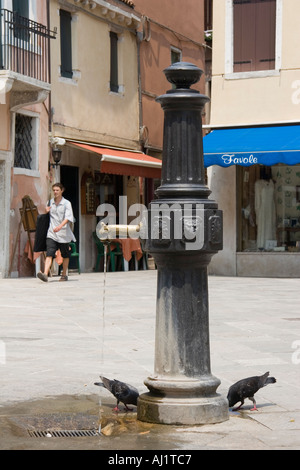 Public water from well in the Dorsoduro district of Venice Italy Stock Photo