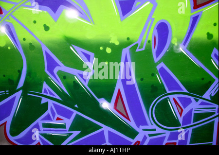 Graffiti background in vibrant green and purple Stock Photo